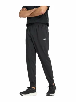 Urheiluhousut & Treenitrikoot<New Balance Sport Essentials Woven Jogger -housut BK BLACK