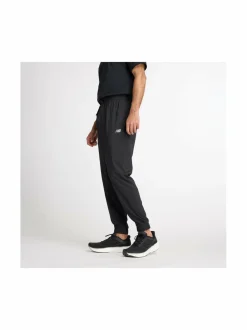 Urheiluhousut & Treenitrikoot<New Balance Sport Essentials Woven Jogger -housut BK BLACK
